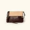 Buffalo Jackson Trading Co. Madison Waxed Canvas Crossbody Foldover Clutch | Cotton Summer W/ Dark Hazelnut Leather 2 Buffalo Jackson Trading Co. Madison Waxed Canvas Crossbody Foldover Clutch | Cotton Summer W/ Dark Hazelnut Leather