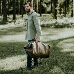 Buffalo Jackson Trading Co. Dakota Waxed Canvas Military Sea Bag Backpack | Field Khaki W/ Chestnut Brown Leather 19 Buffalo Jackson Trading Co. Dakota Waxed Canvas Military Sea Bag Backpack | Field Khaki W/ Chestnut Brown Leather
